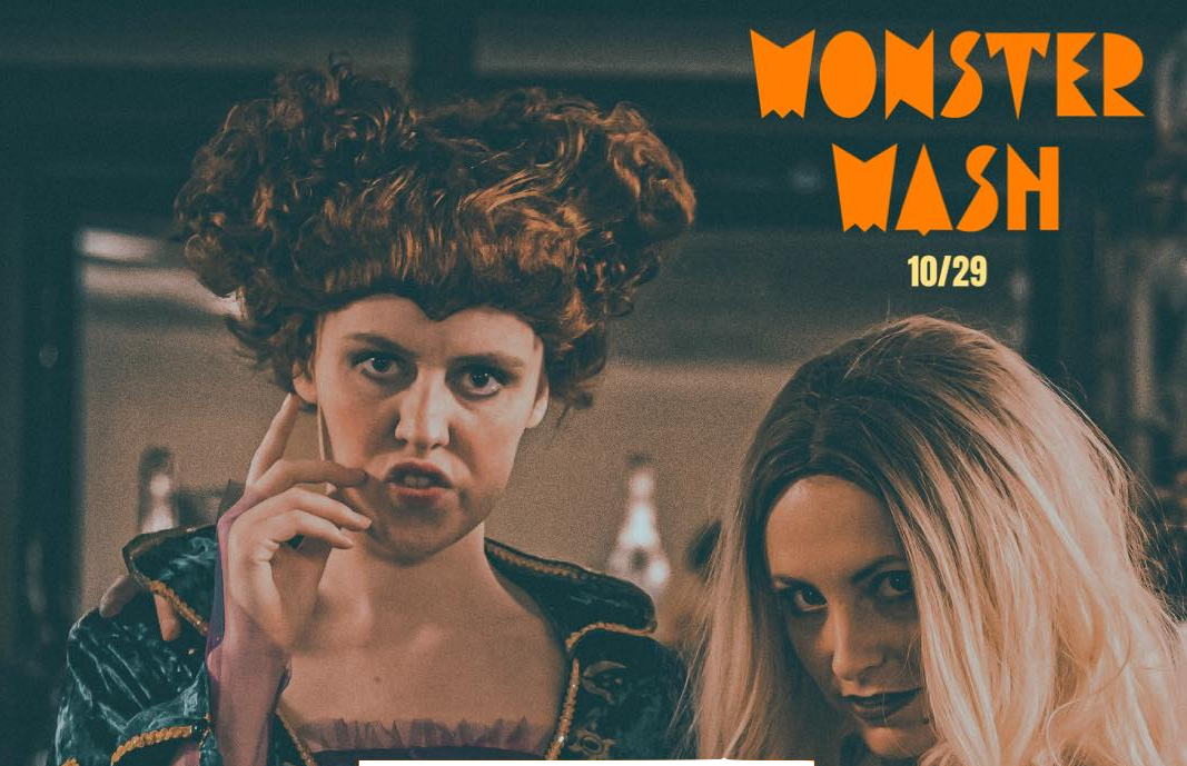 Actors dressed up as two witches from "Hocus Pocus", under a heading that says "Monster Mash 10/29"