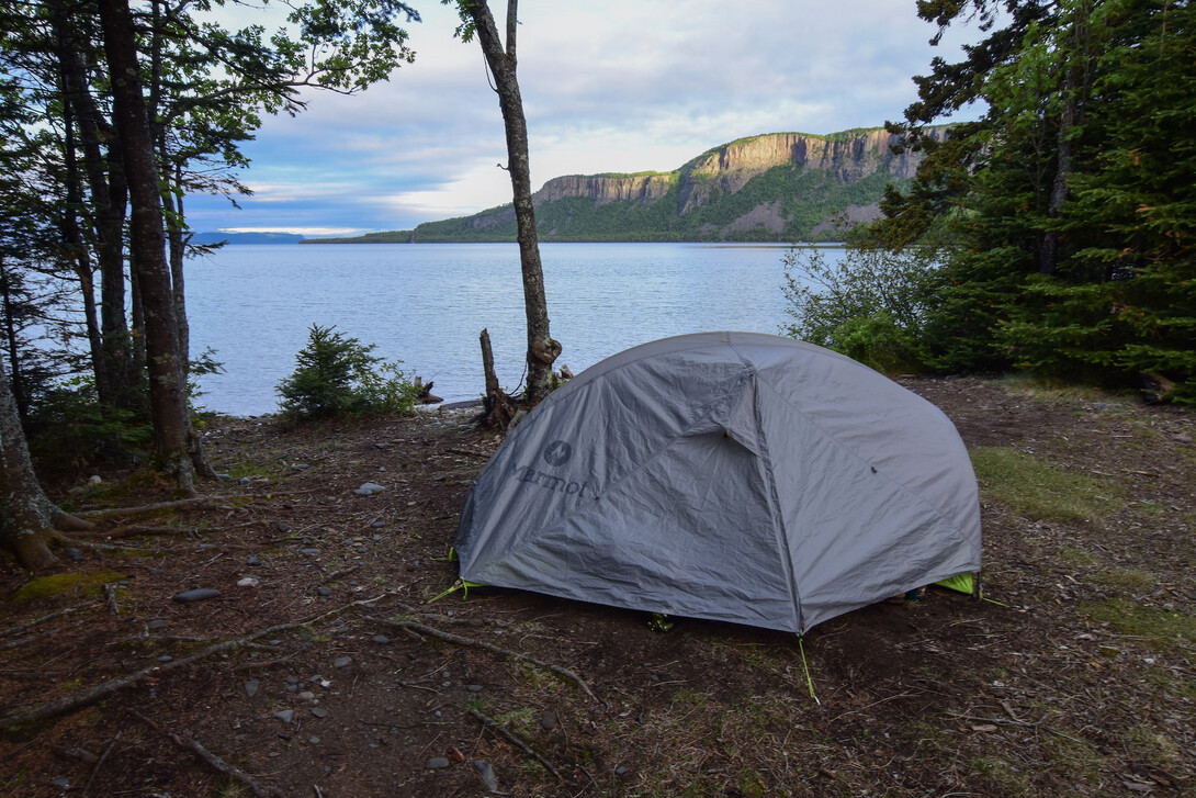 a tent in a forested area overlooking the lake in Sleeping Giant Provincial Park