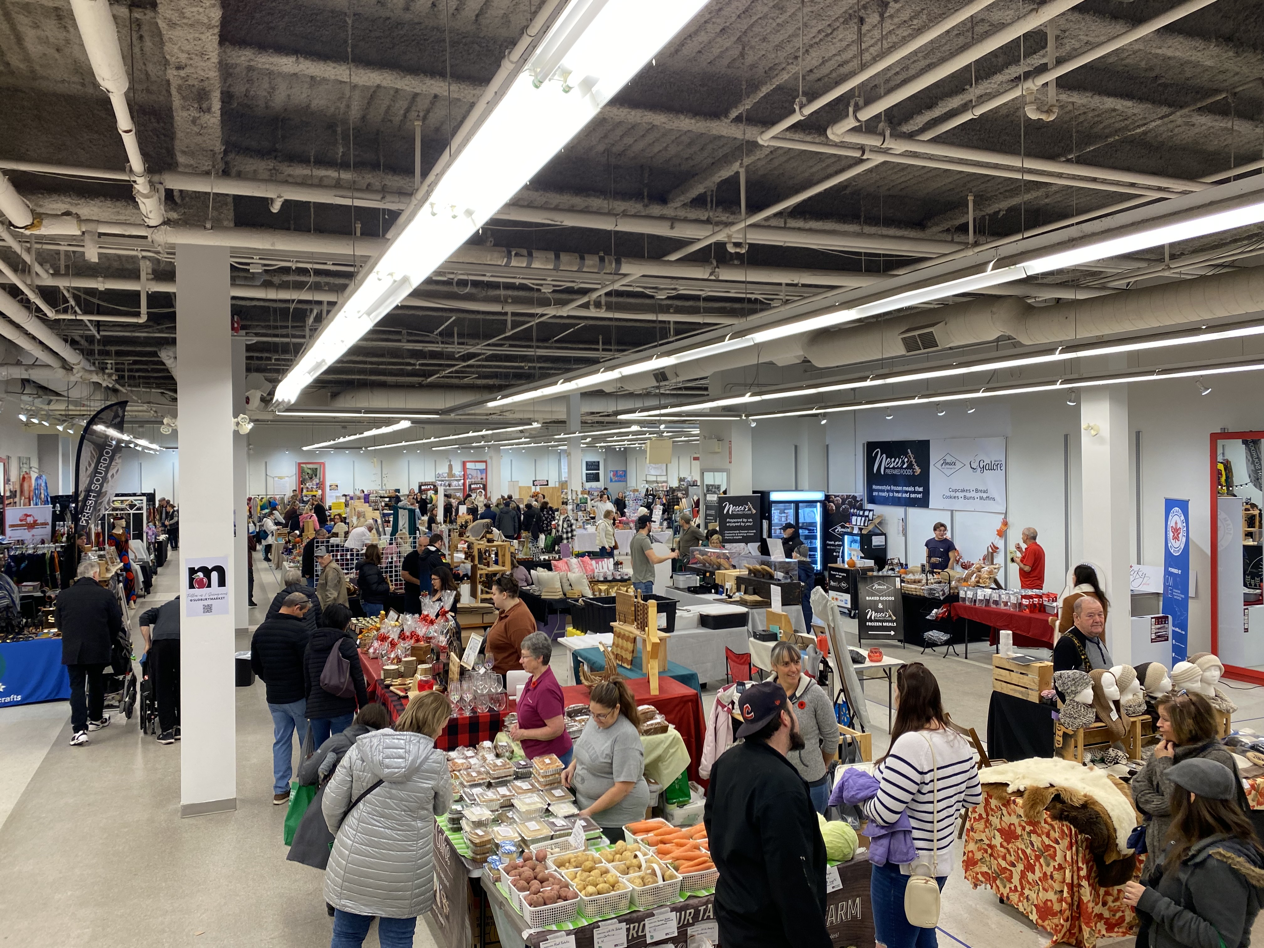 people shop indoors at the Sudbury Market