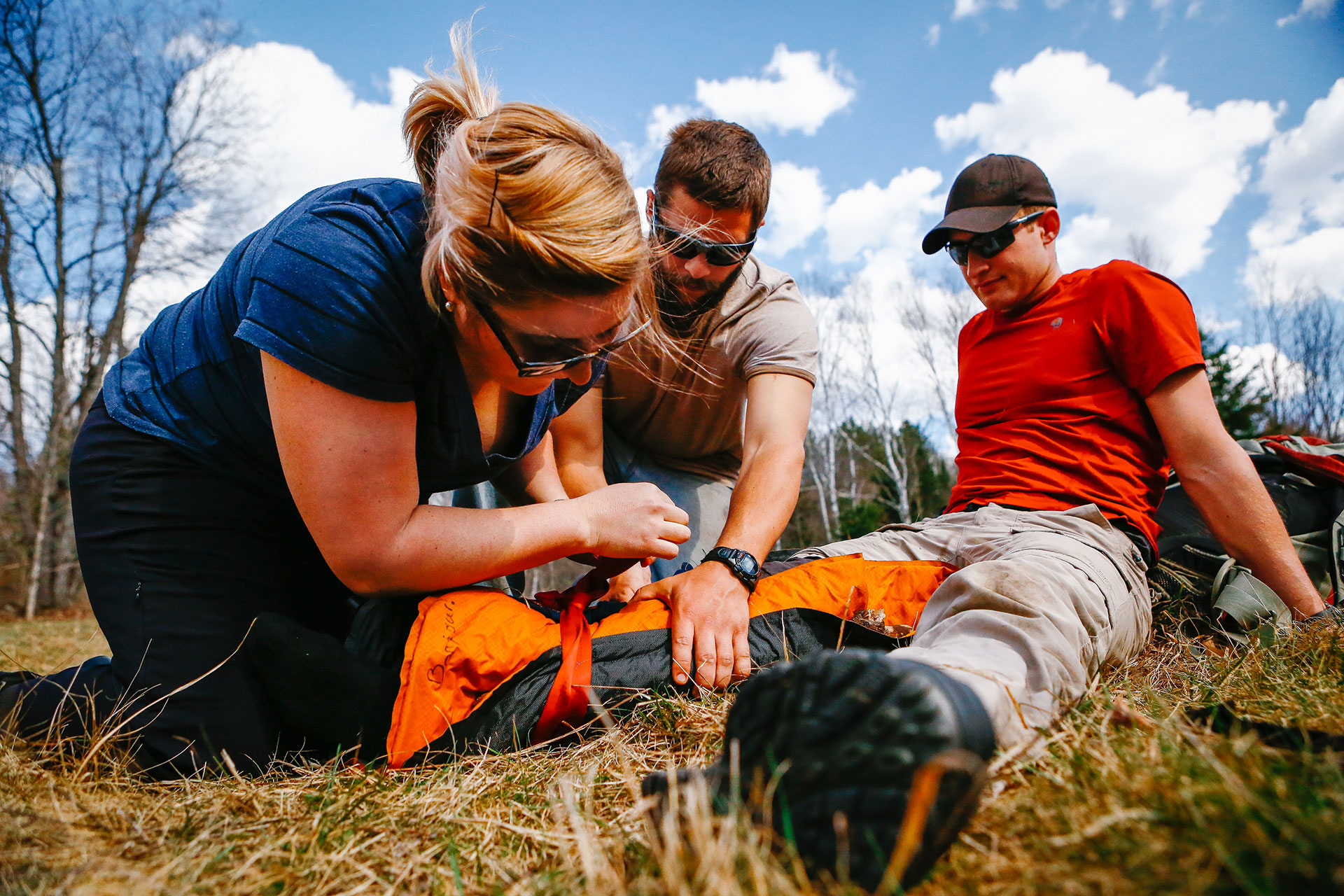 during a course, people practice providing wilderness first aid