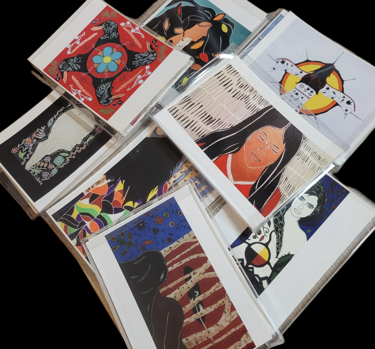 a series of beautiful indigenous imagery painted postcards by Janelle Wawia