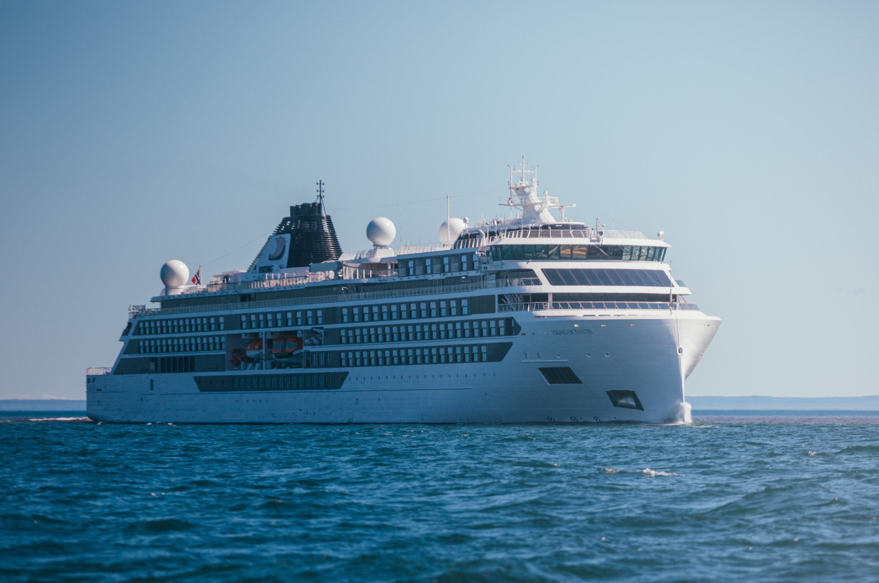  A large passenger cruise ship approaching Thunder Bay on Lake Superior under a very blue sky. 