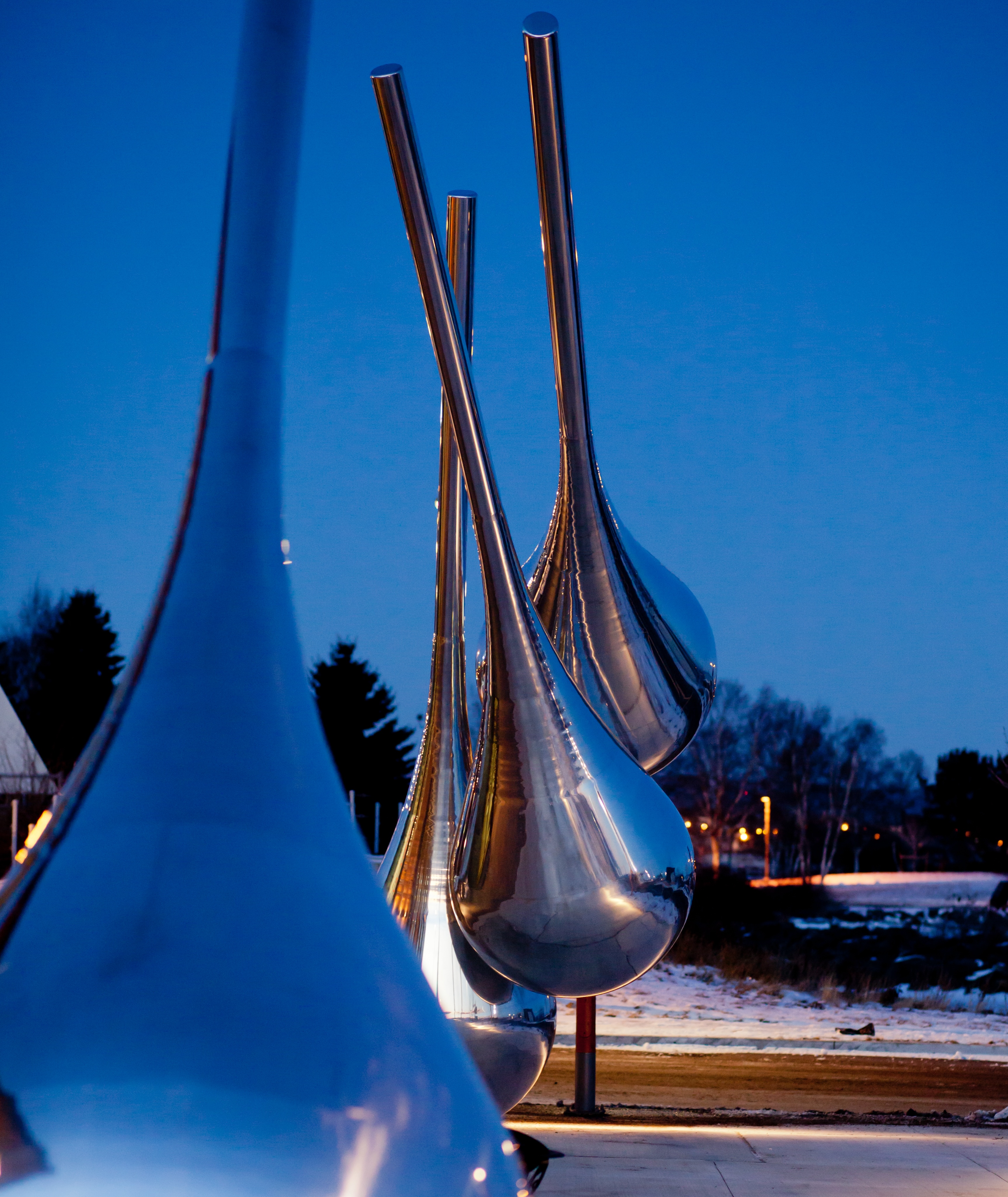 "Traveller's Return by Andy Davies; An art installation made up of a series of large, highly-polished metal water drops on display at Prince Arthur's Landing