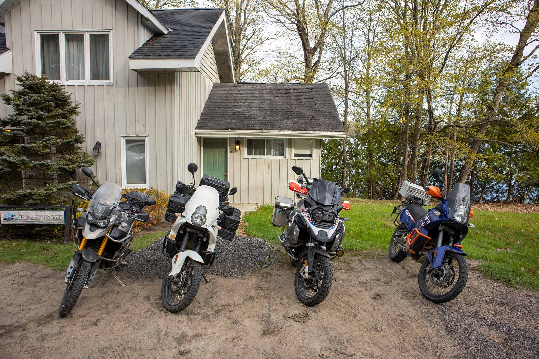 Four Motorcycles on grass.