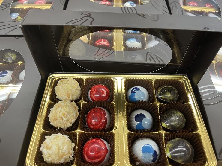 12 colourful chocolates in a box from Raven Rising. 