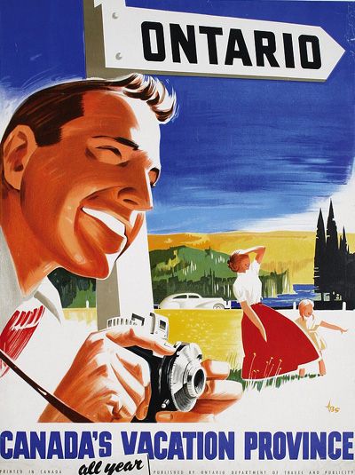 a vintage ad featuring colourful illustration of a smiling man holding a camera, with bright blue sky, rolling hills and a woman and child wearing summer clothing standing windswept in the background, looking off into the distance as the child points. An oversized white wooden sign says "Ontario", and at the bottom of the page blue text reads "Canada's Vacation Province, all year".