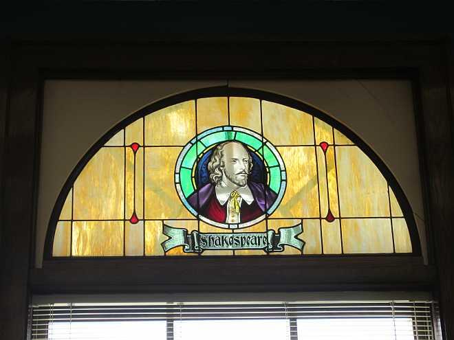 A stained glass window featuring an image of Shakespeare, found at the Brodie Street Library in Thunder Bay.