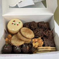 A close-up of the cookies, marshmallow squares and chocolate treats that are made at Rachelle's Lil' Cake Shop