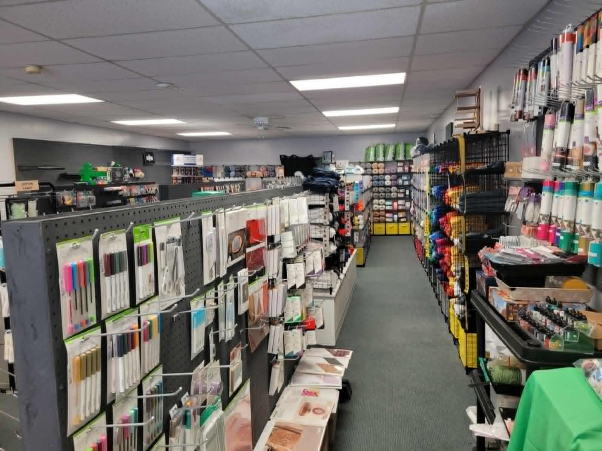 A zoom-out of an aisle in the interior of the craft magic store