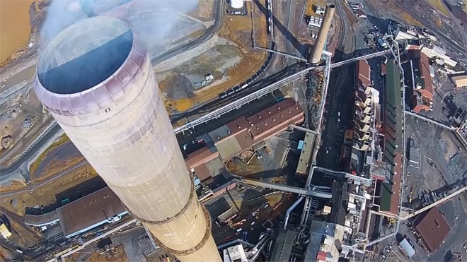 A shot from the top of the immense Sudbury Superstack, the ground and buildings extremely far below.