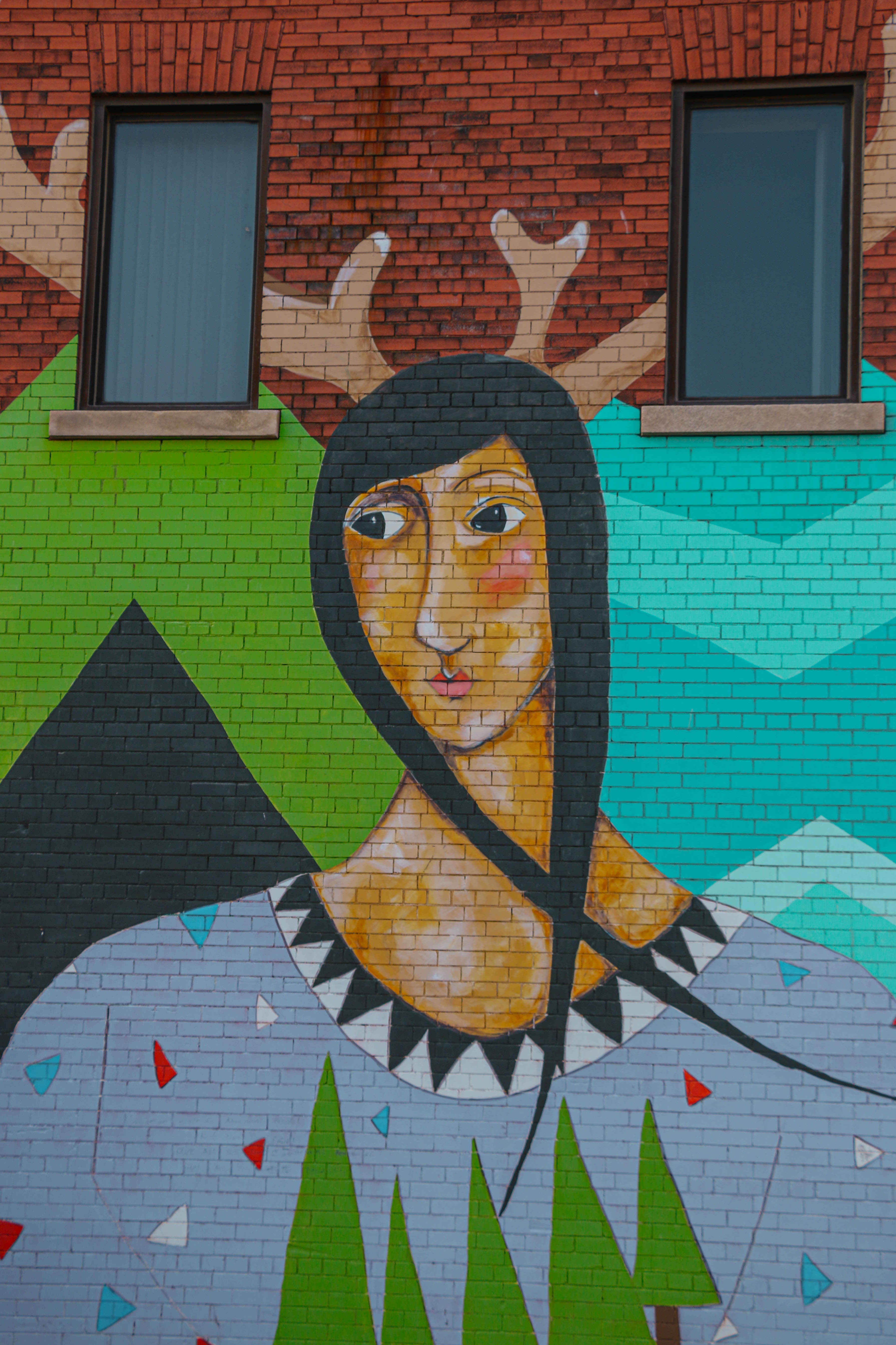 Mural of colourful dear person 