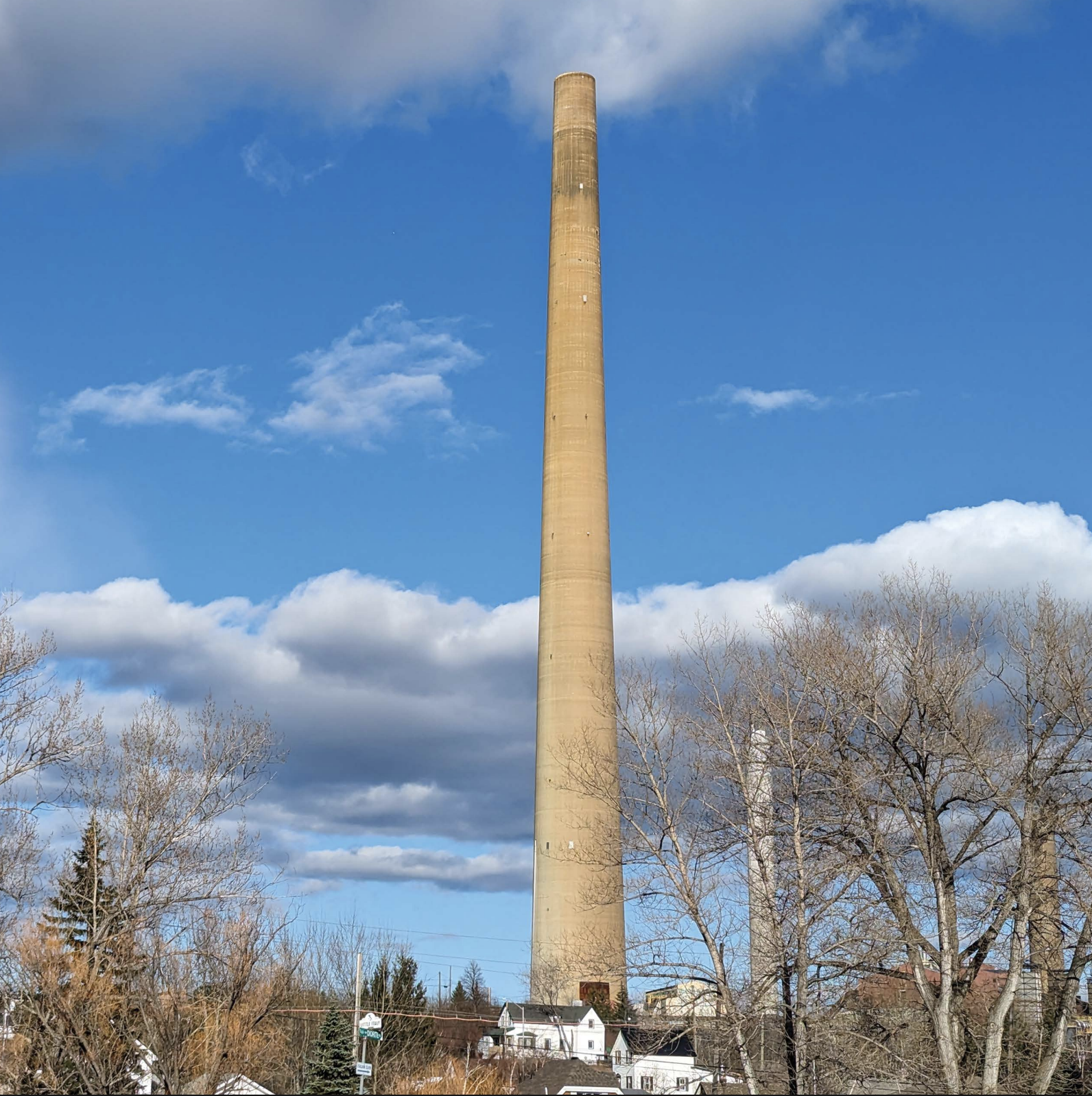 Sudbury superstack chimney against a blue sky. 