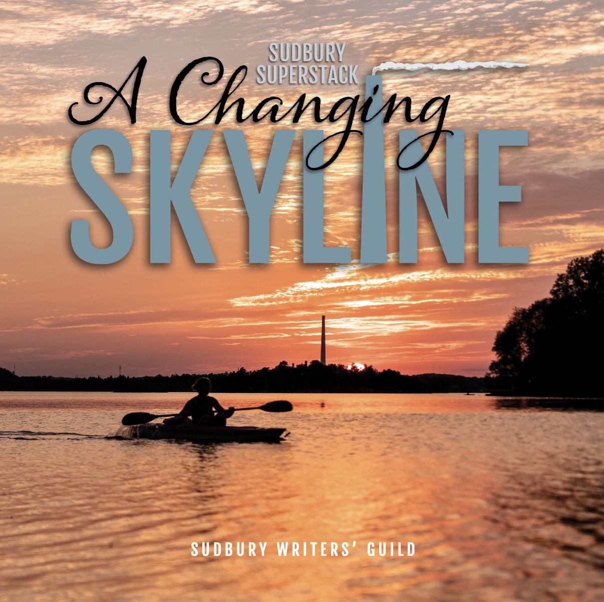 The front cover of Sudbury Superstack: A Changing Skyline, showing kayaker on a lake at sunset, with the tall superstack silhouetted on the skyline in the distance.