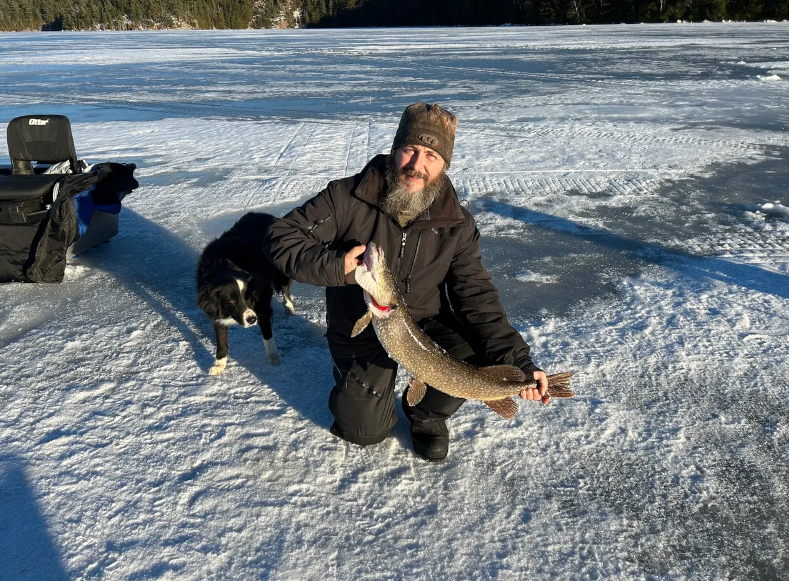 Northern pike ice fishing Snowshoe Camp Resort