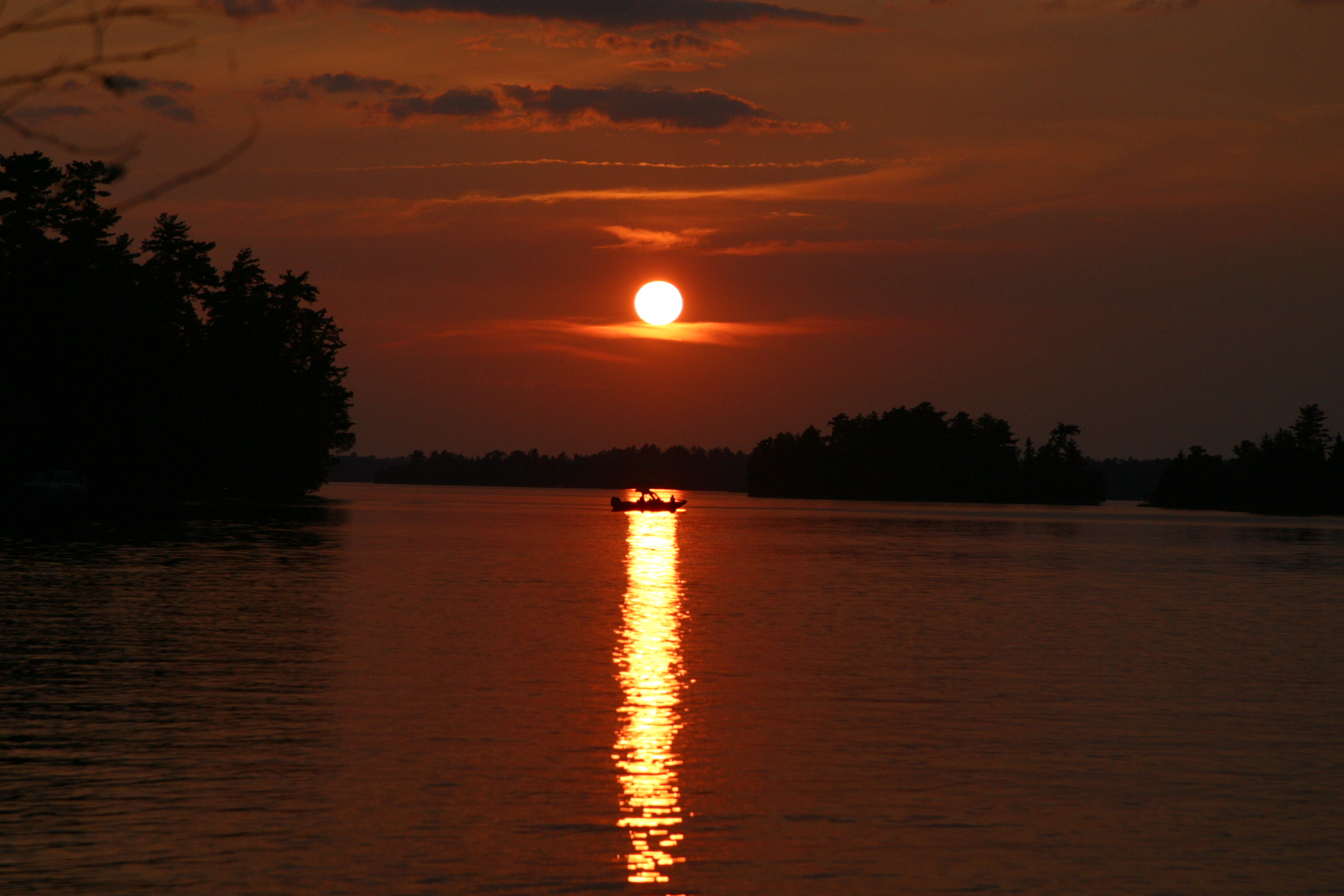 Boating at sunset on Lake of the Woods