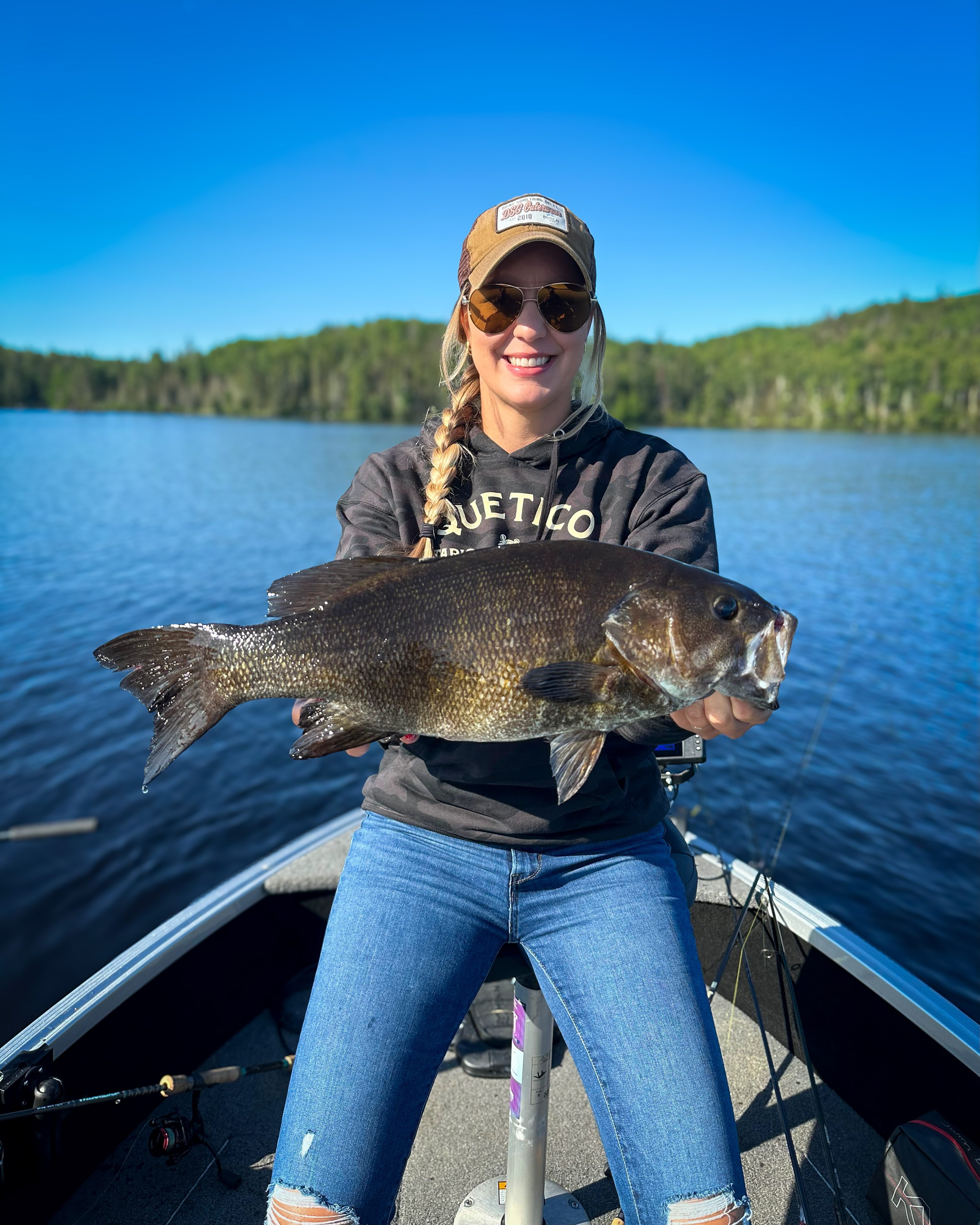 Krysten Potega with a 20-inch smallmouth bass.