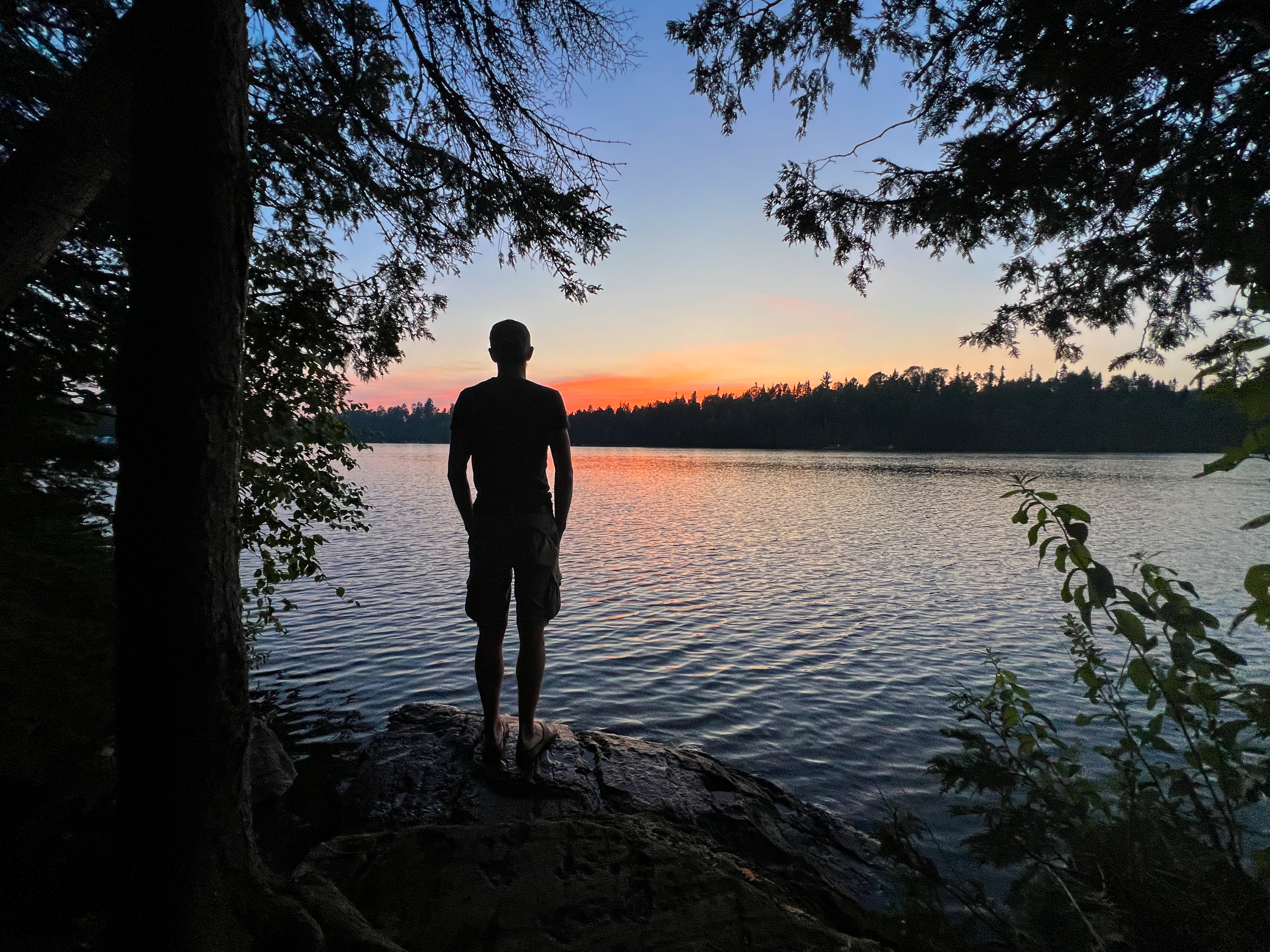 Sunset at a lake with a man