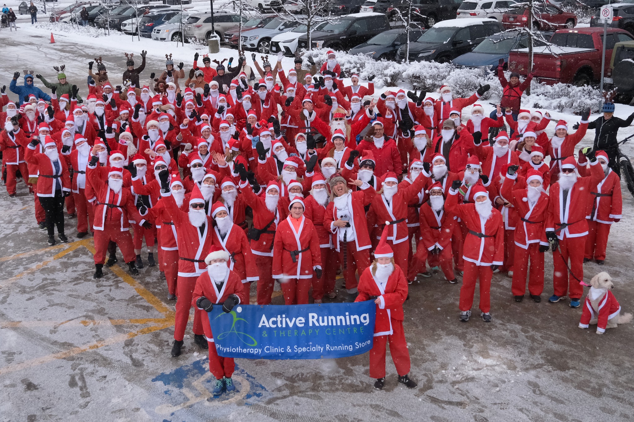 Santas dressed up for a run in the snow in North Bay Ontario.