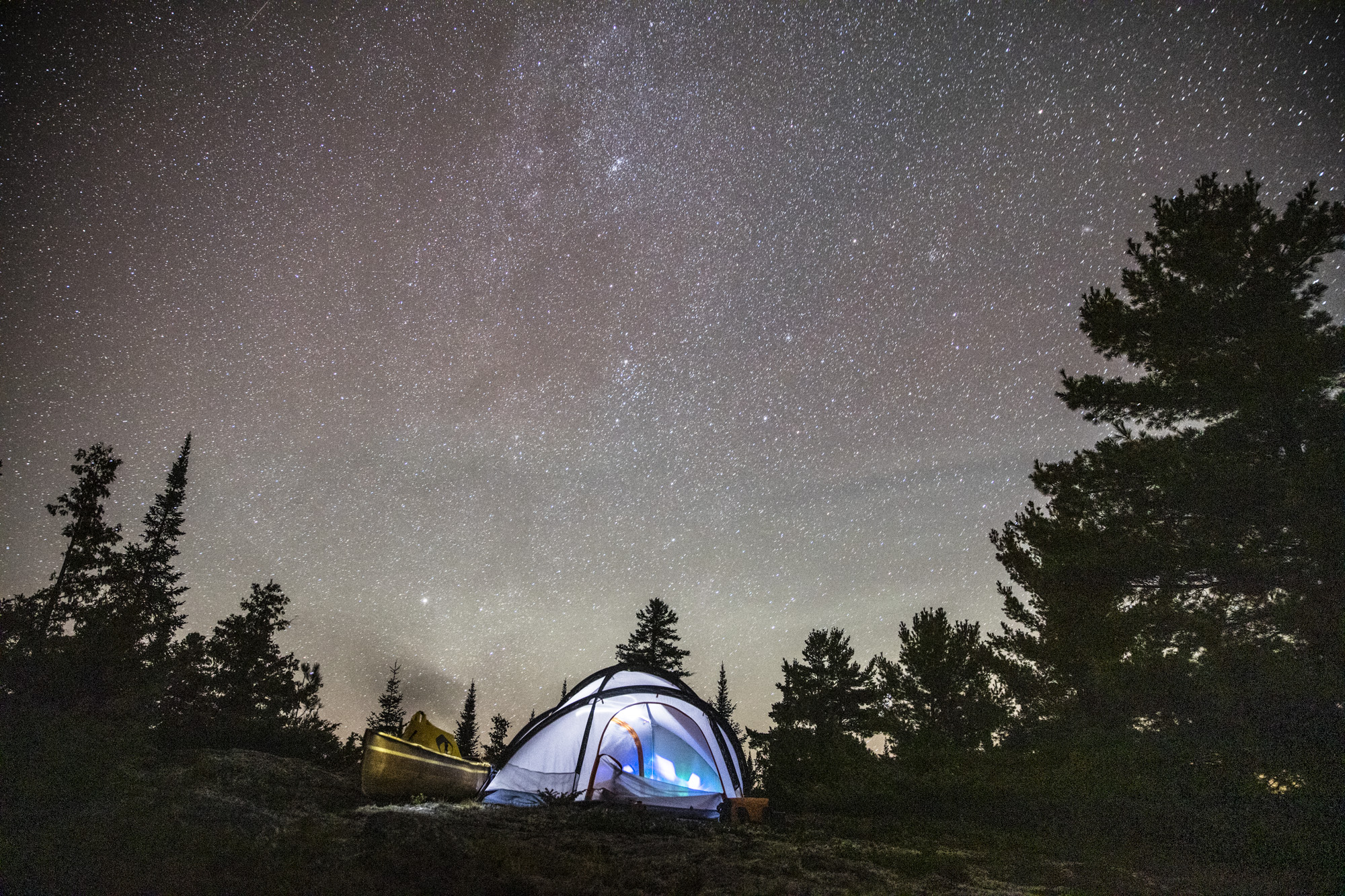 Canoe camping under the stars. Credit: David Jackson | @davidjackson__