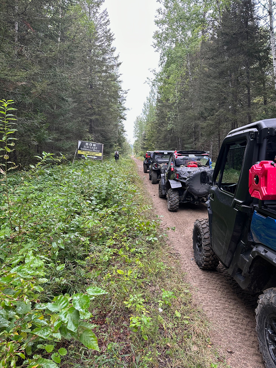 Atvs in a line.