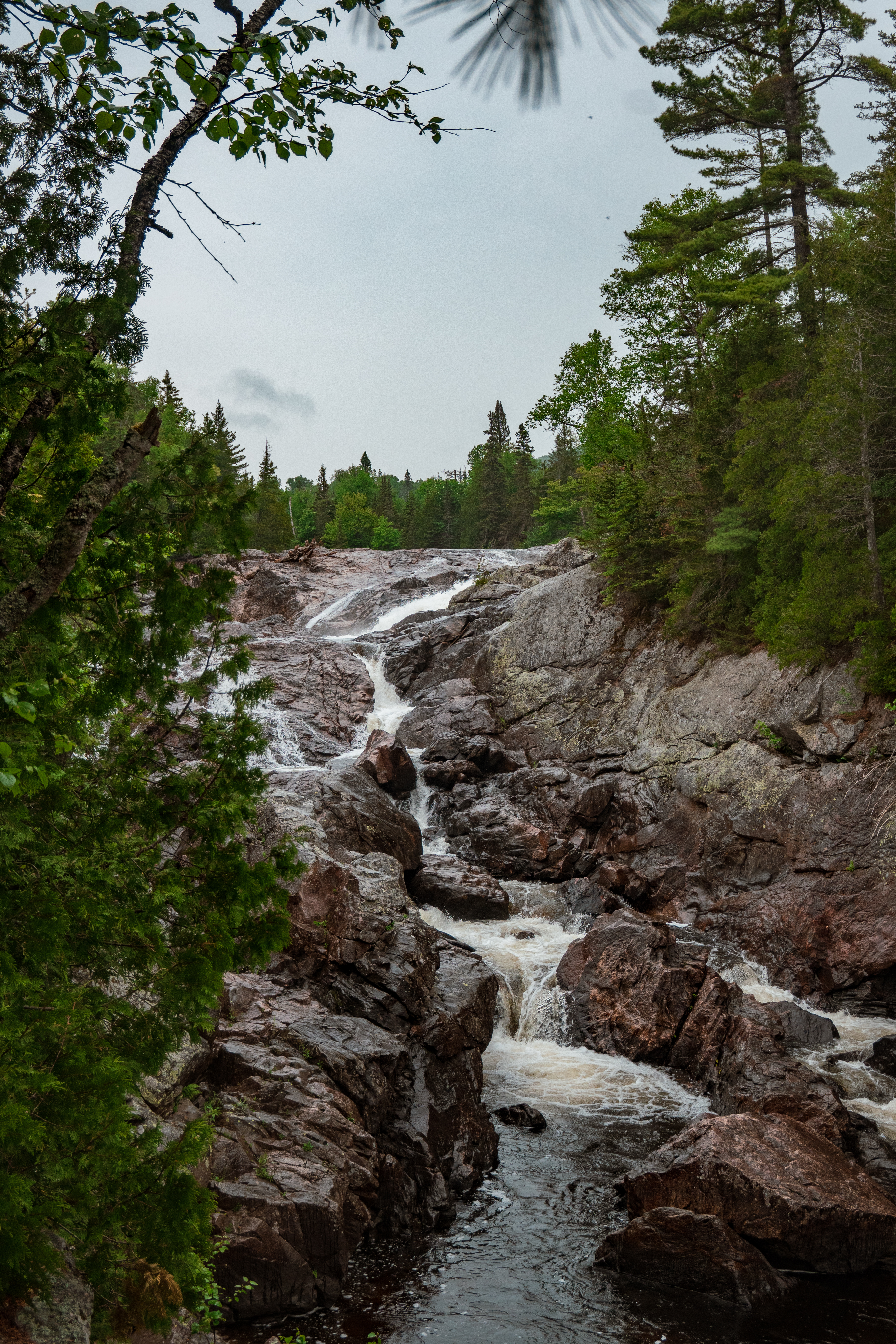 : Exploring Sand River Falls in Lake Superior Provincial Park. • Photo: Katie MacDonald | @yourmatiekatie