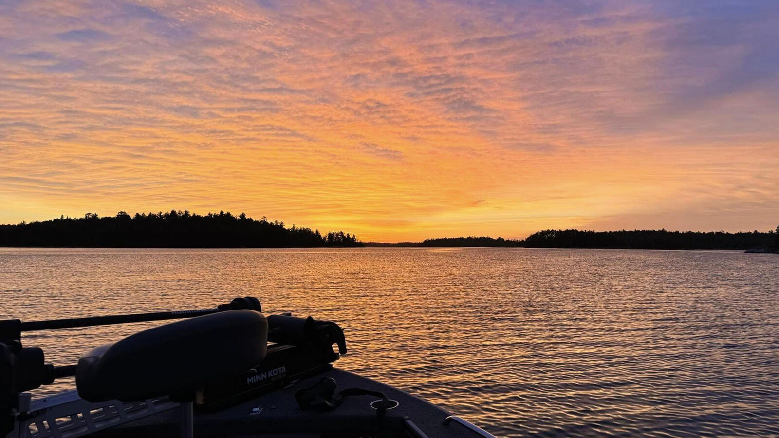 Sunset view from the docks at Camp Narrows Lodge.