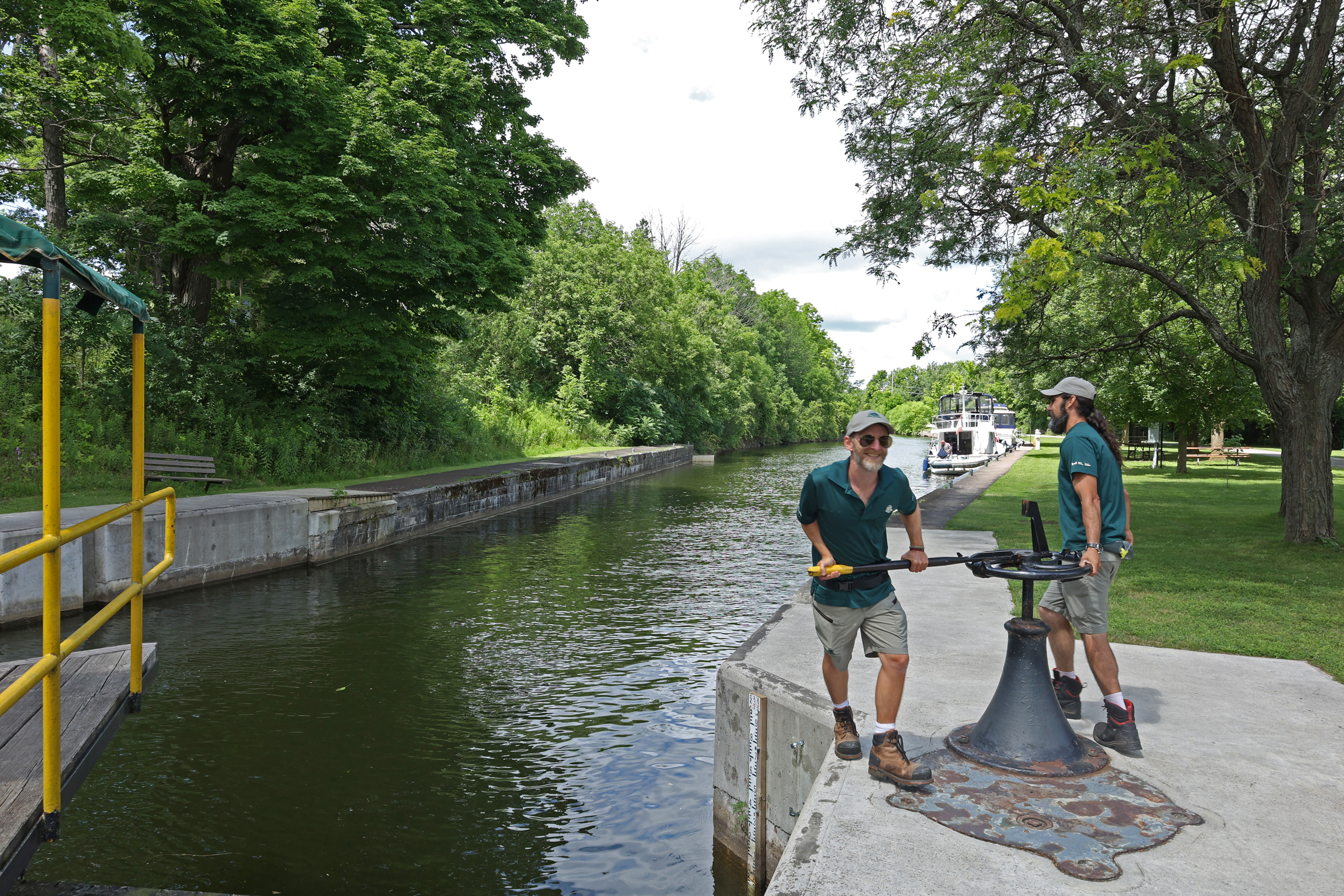 Trent Severn Waterway Parks Canada employees working the locks.