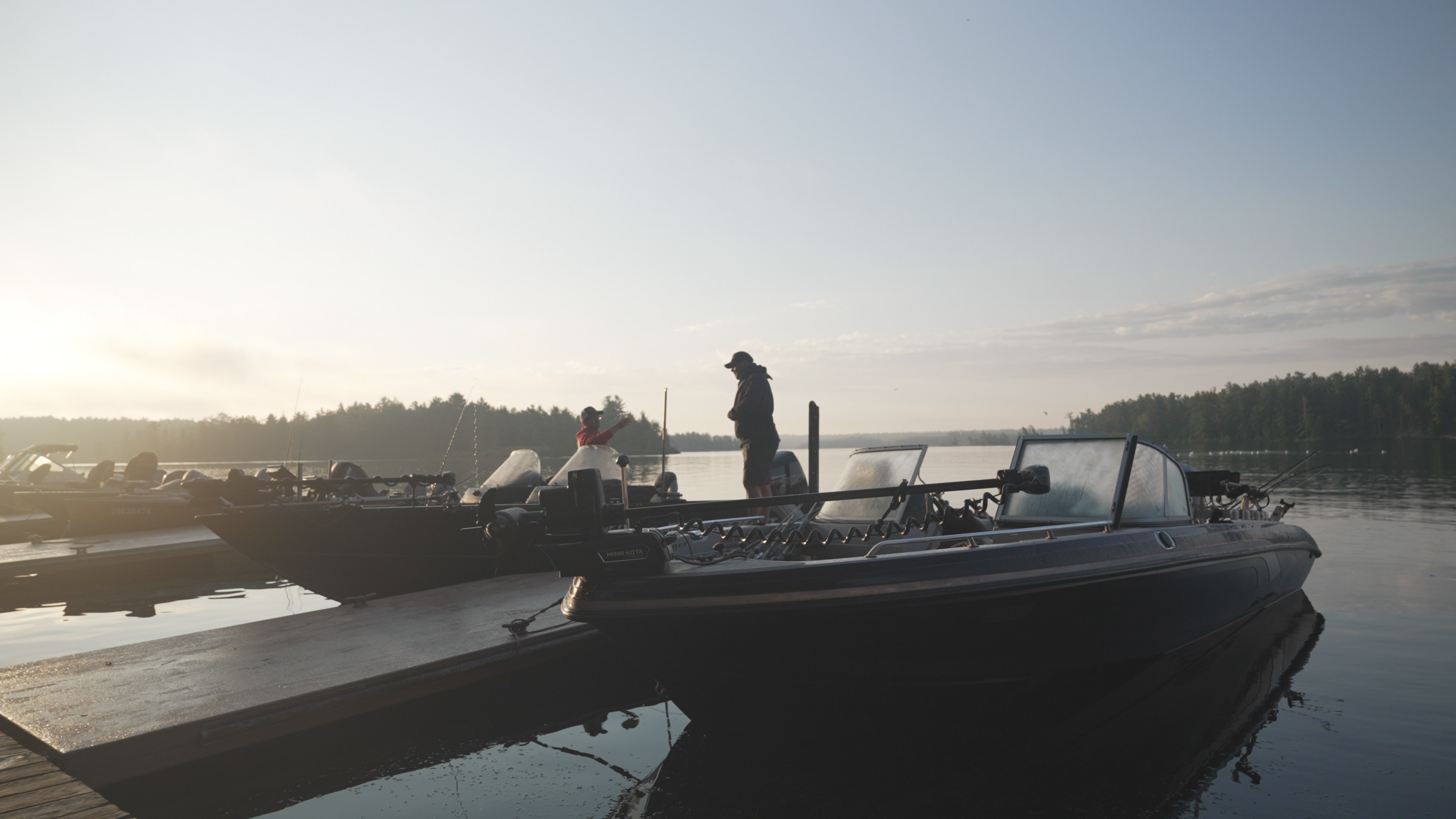 angler on docked boat