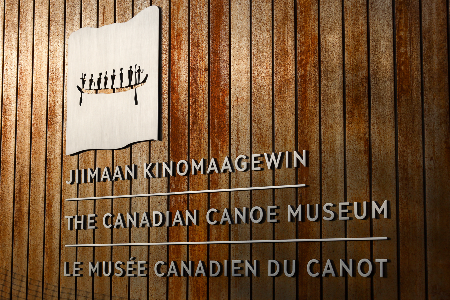 The Canadian Canoe Museum’s new trilingual logo on the side of the Canoe House.