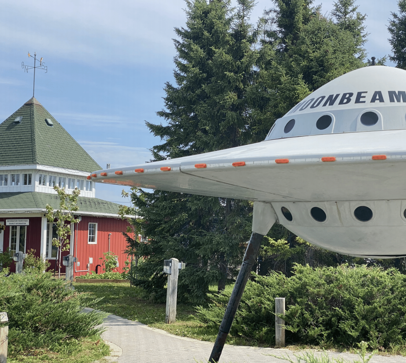 The Moonbeam Tourist Information Centre, with its iconic UFO statue outside.