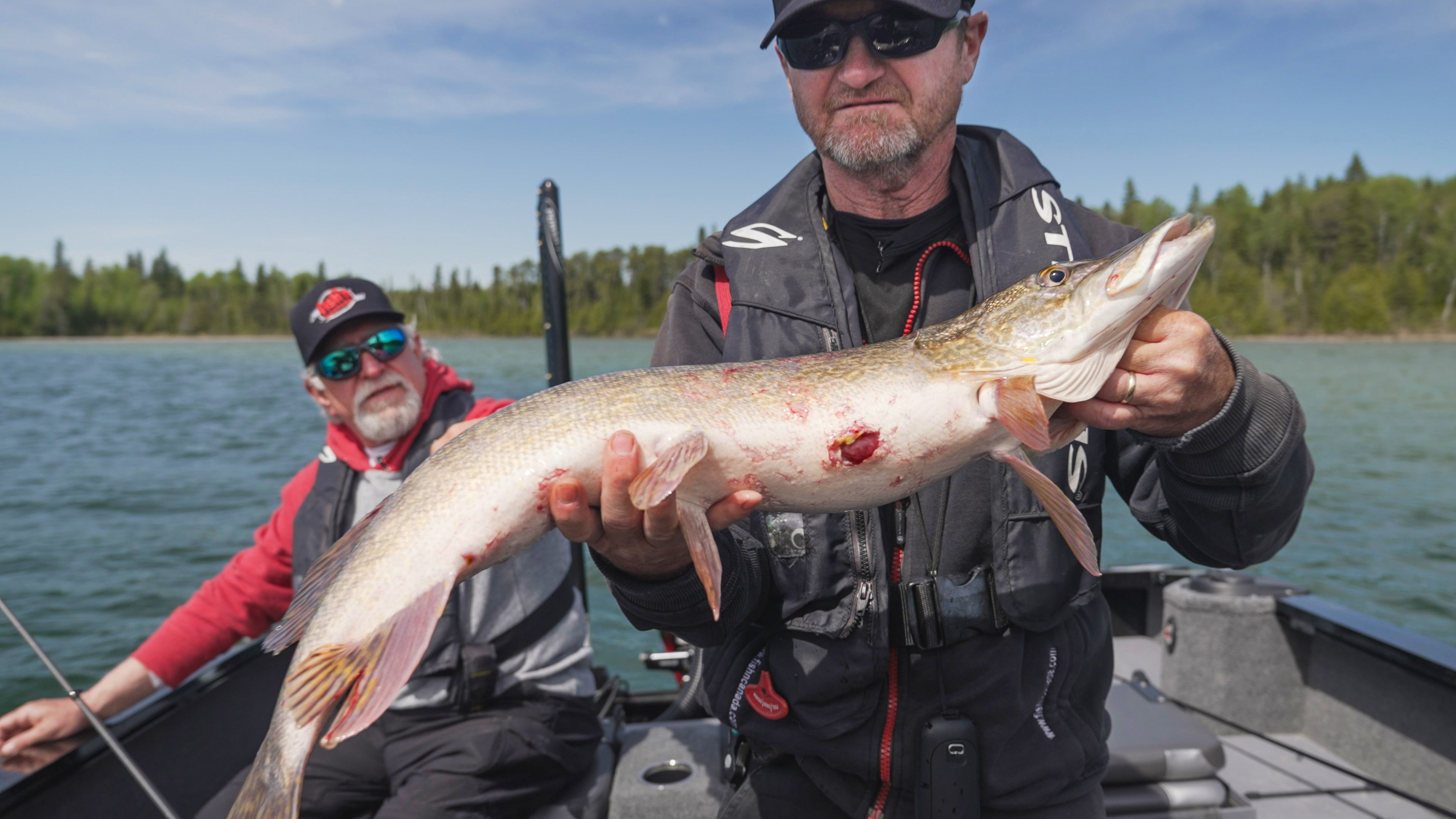 2 anglers fishing northern pike