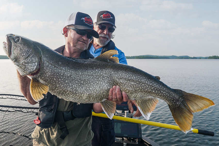 angler holding large lake trout