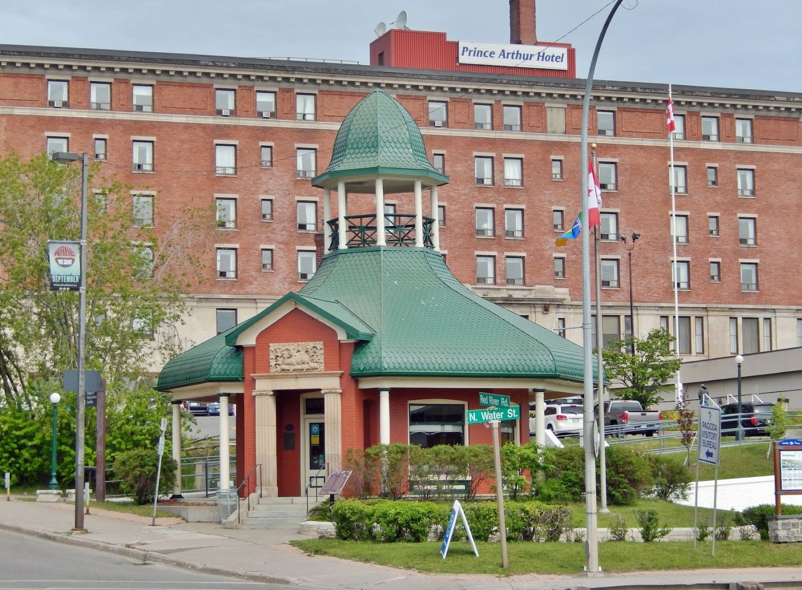 Thunder Bay Visitor's Centre Pagoda; a circular brick building with green tower roof.