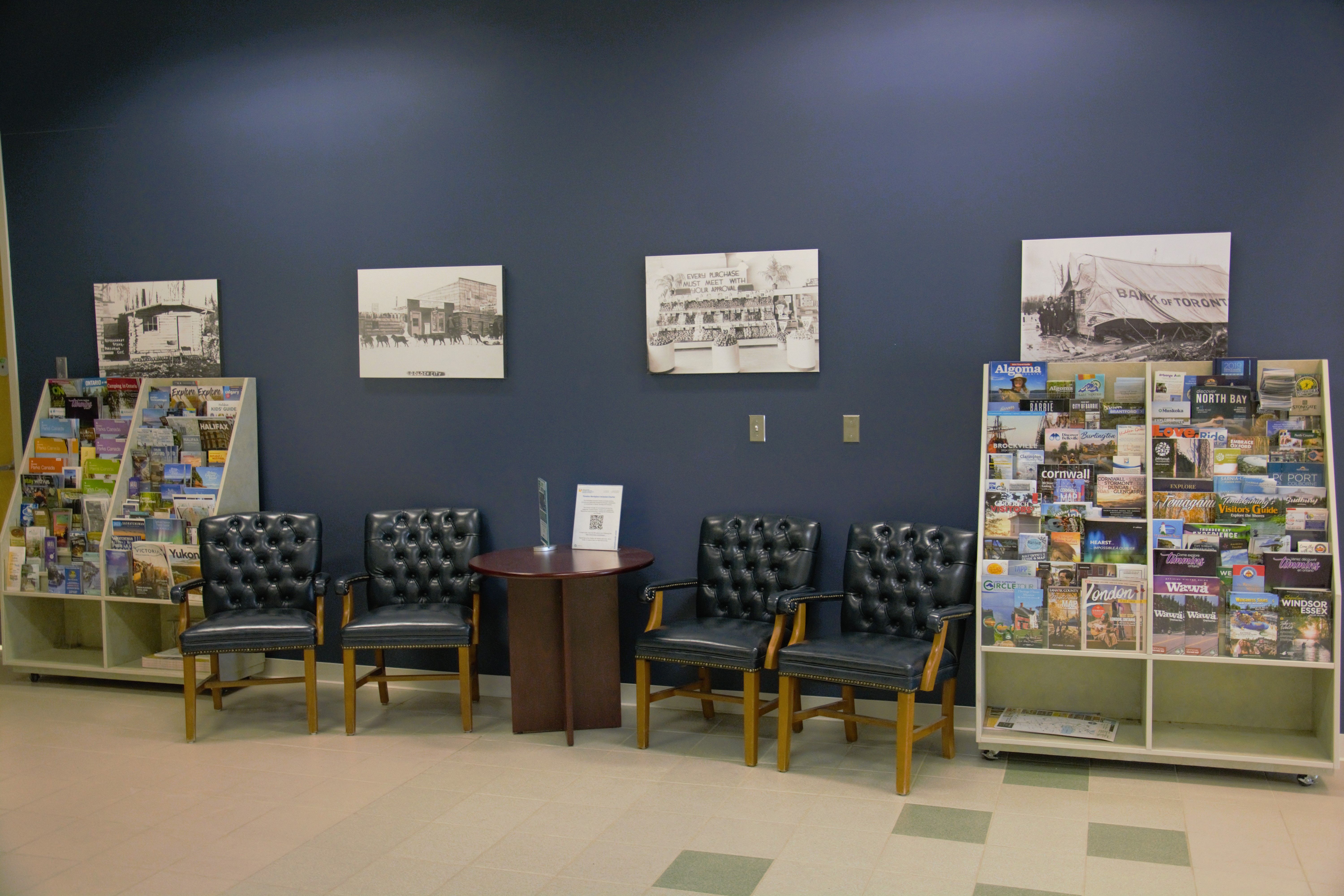 Comfortable chairs and racks full of informational travel brochures at the Timmins Convention Bureau and Visitor Welcome Centre