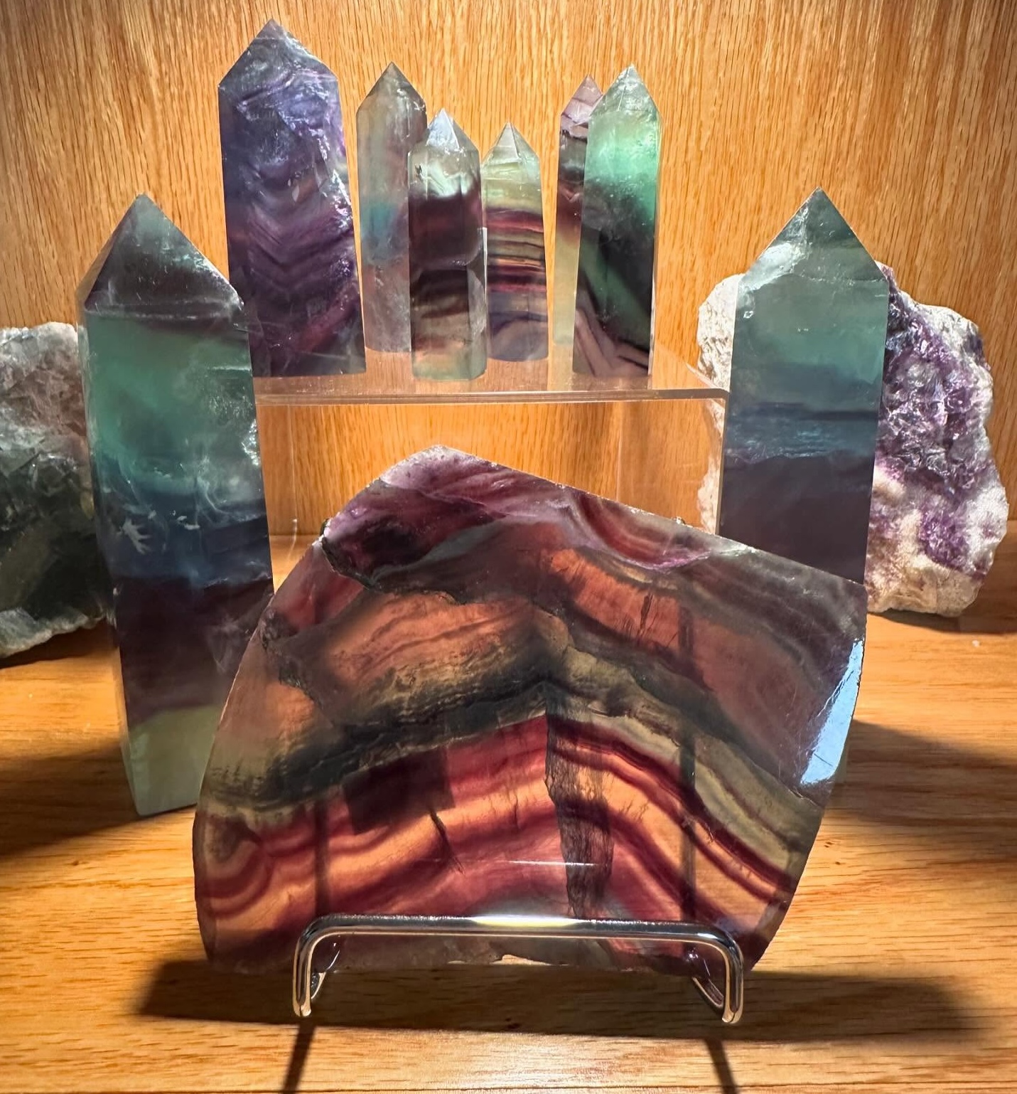 large colourful fluorite crystals in an illuminated display.