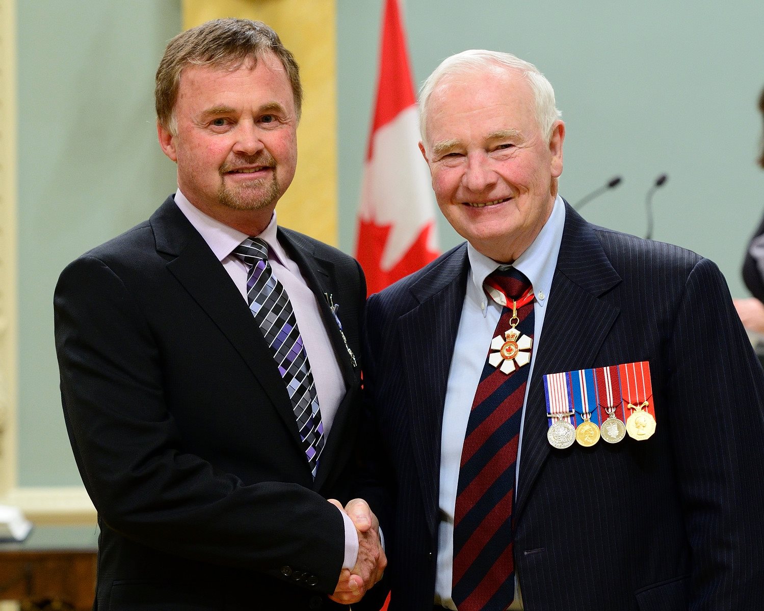A smiling Barry Phippen receiving the The Governor General's Award of Canada.