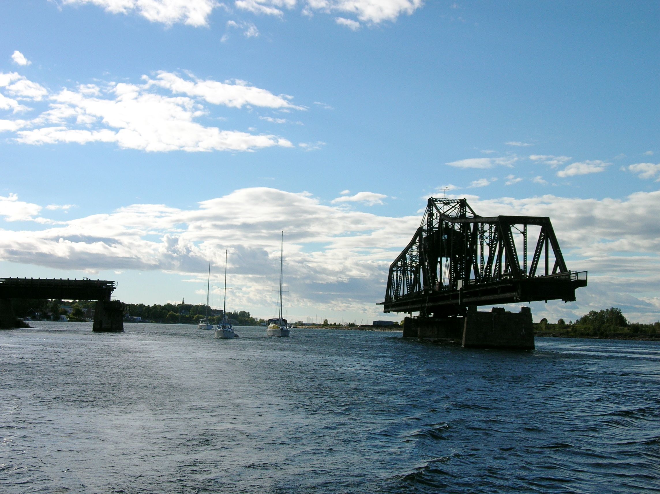 The Little Current Swing Bridge opening to let sailboats through.