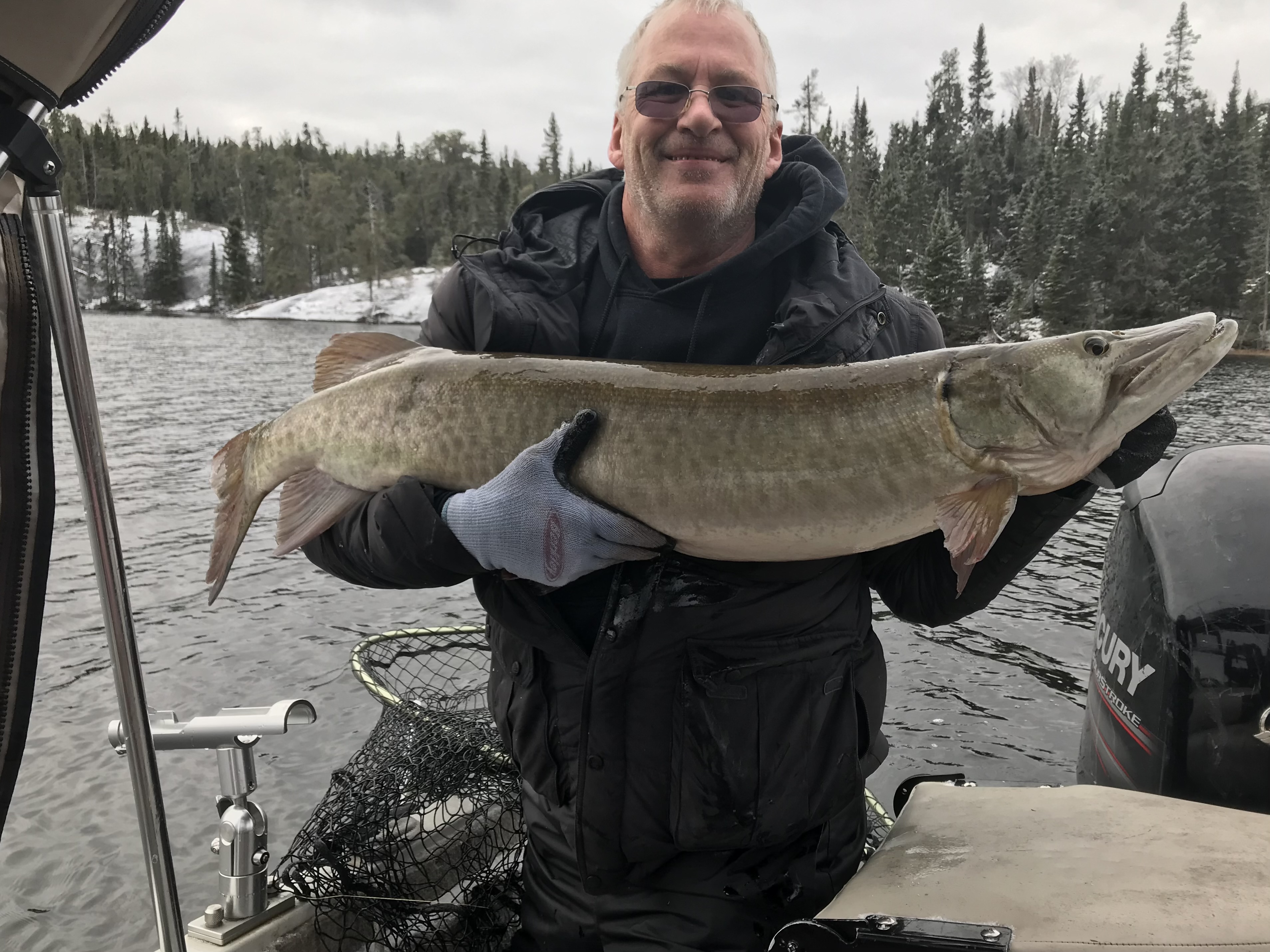 The article author with a large muskie caught in Dryberry Lake in Northwestern Ontario.