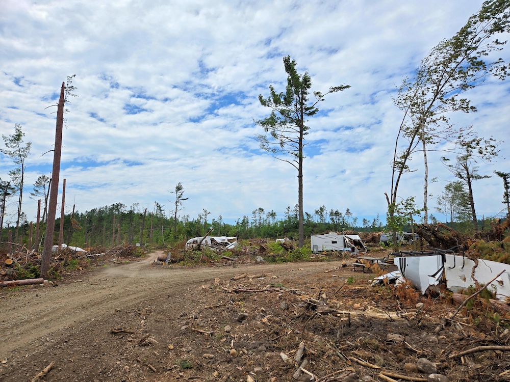 Trailers destroyed in campground with downed trees