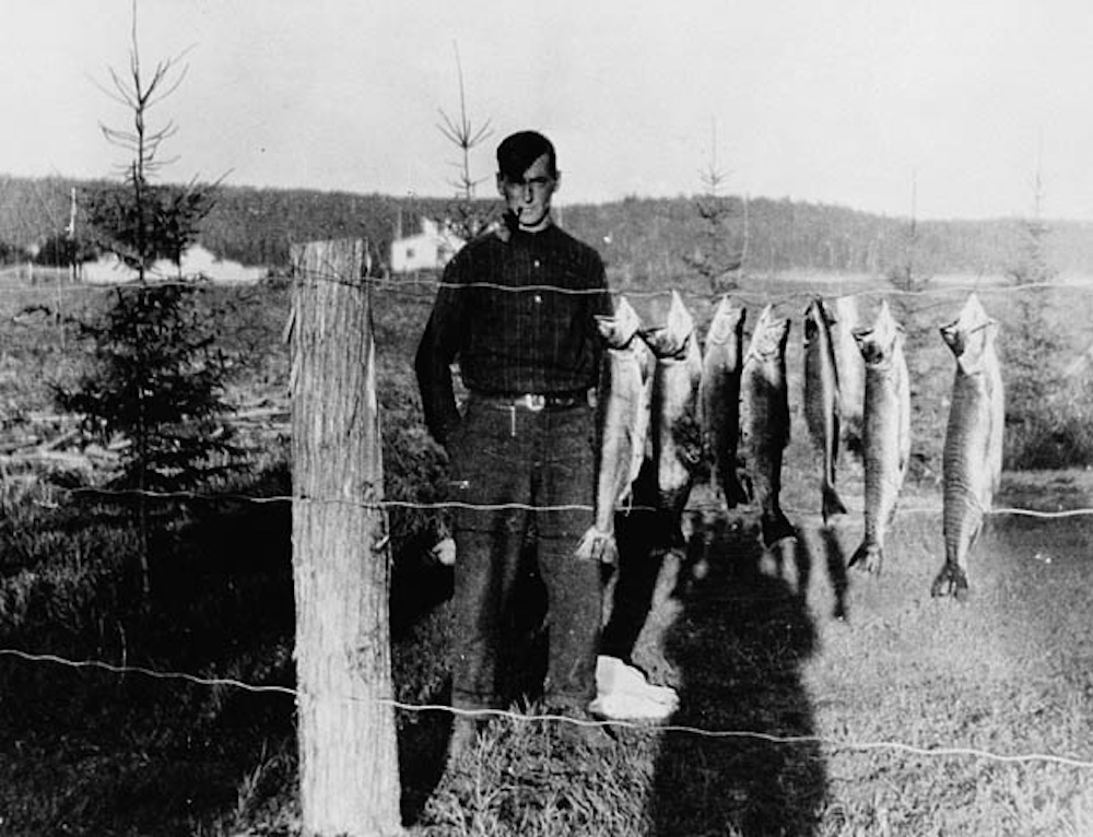 Tom Thomson with stringer of fish