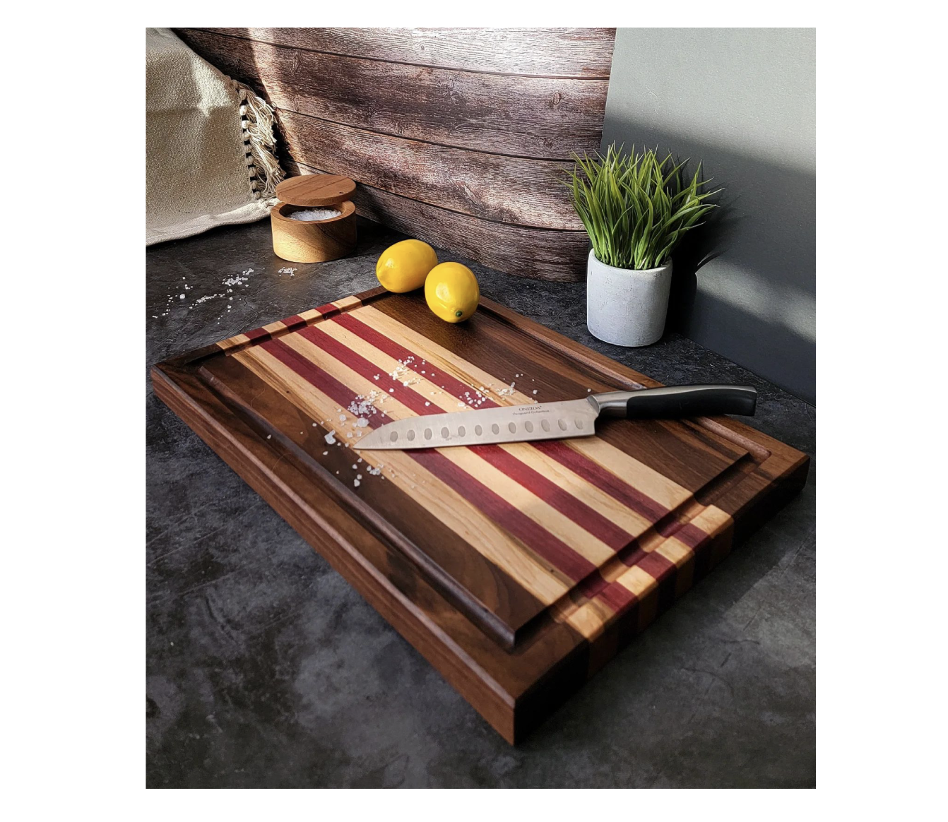 A striking red, cream and dark brown wooden cutting board made in South Porcupine, Ontario.