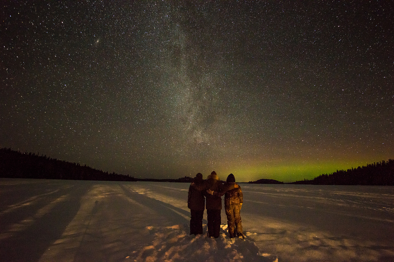 Ice fishing and the northern lights at Anishinabi Lodge.