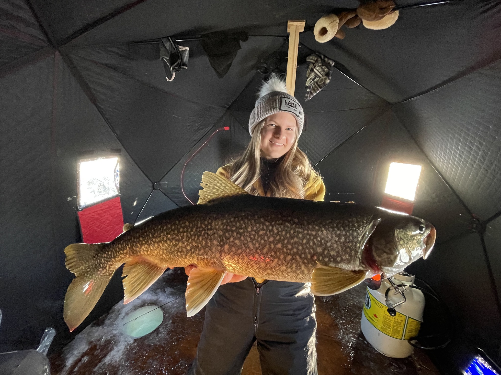 Catch giant lake trout through the ice on Anishinabi lake!