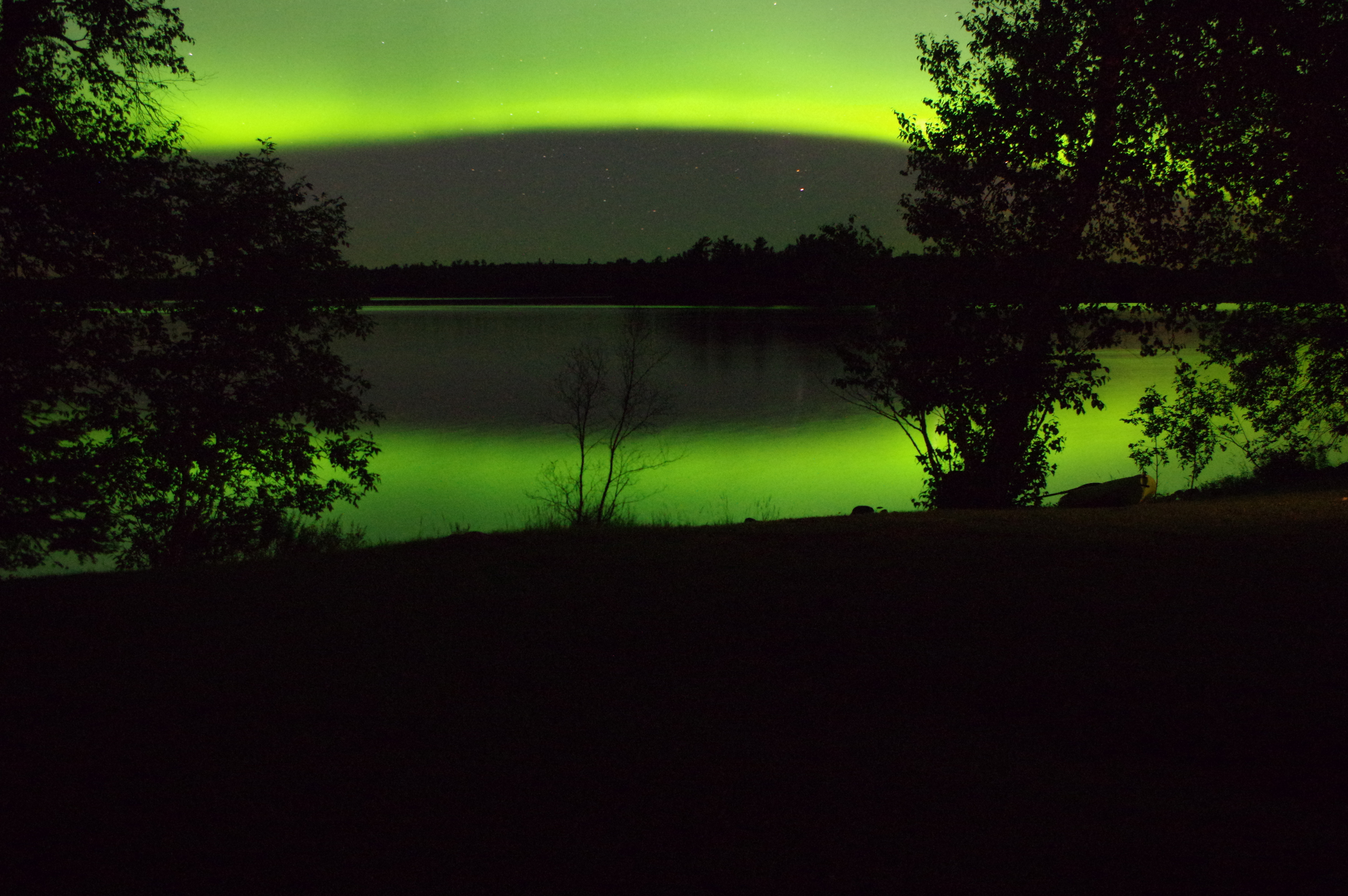 Northern lights shine over Lake of the Woods at Sioux Narrows, Ontario.