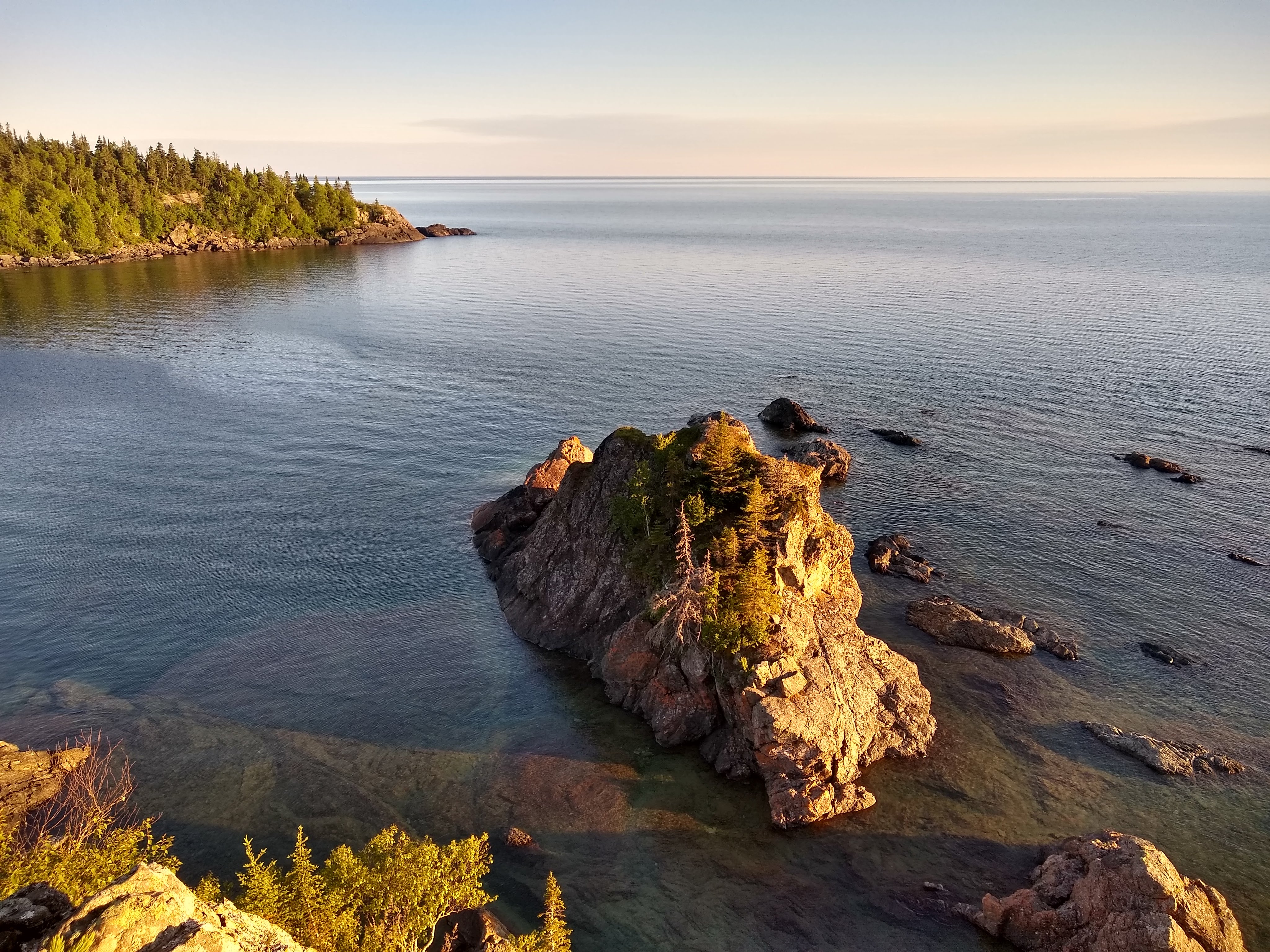 Overhead shot of rocky island on lake
