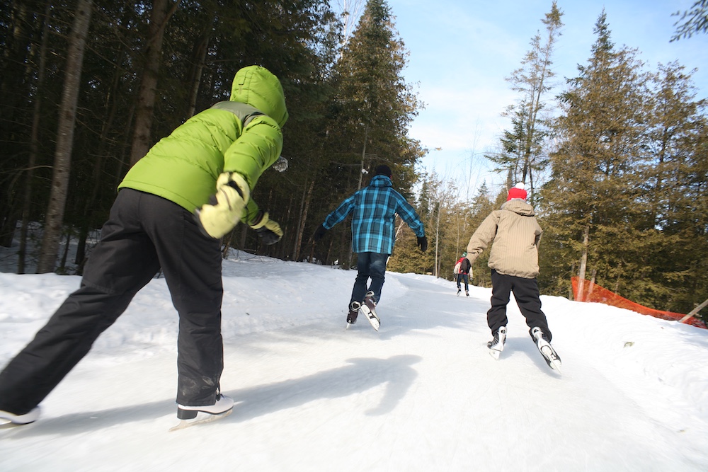 People skating on a skating trail at MacGregor Point
