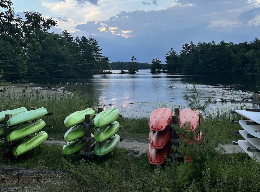 Boat racks next to lake