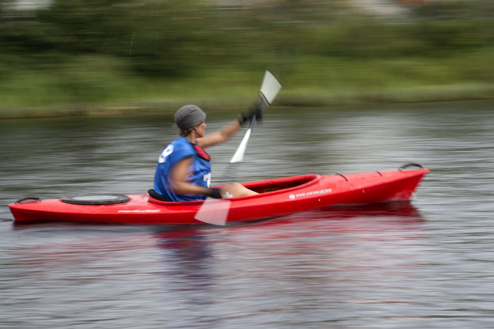 Person racing in a kayak