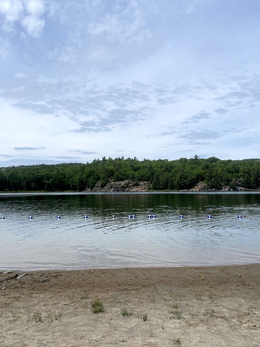 Beach with rocky shore across the water