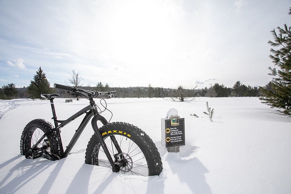 Fat bike in deep snow in a field